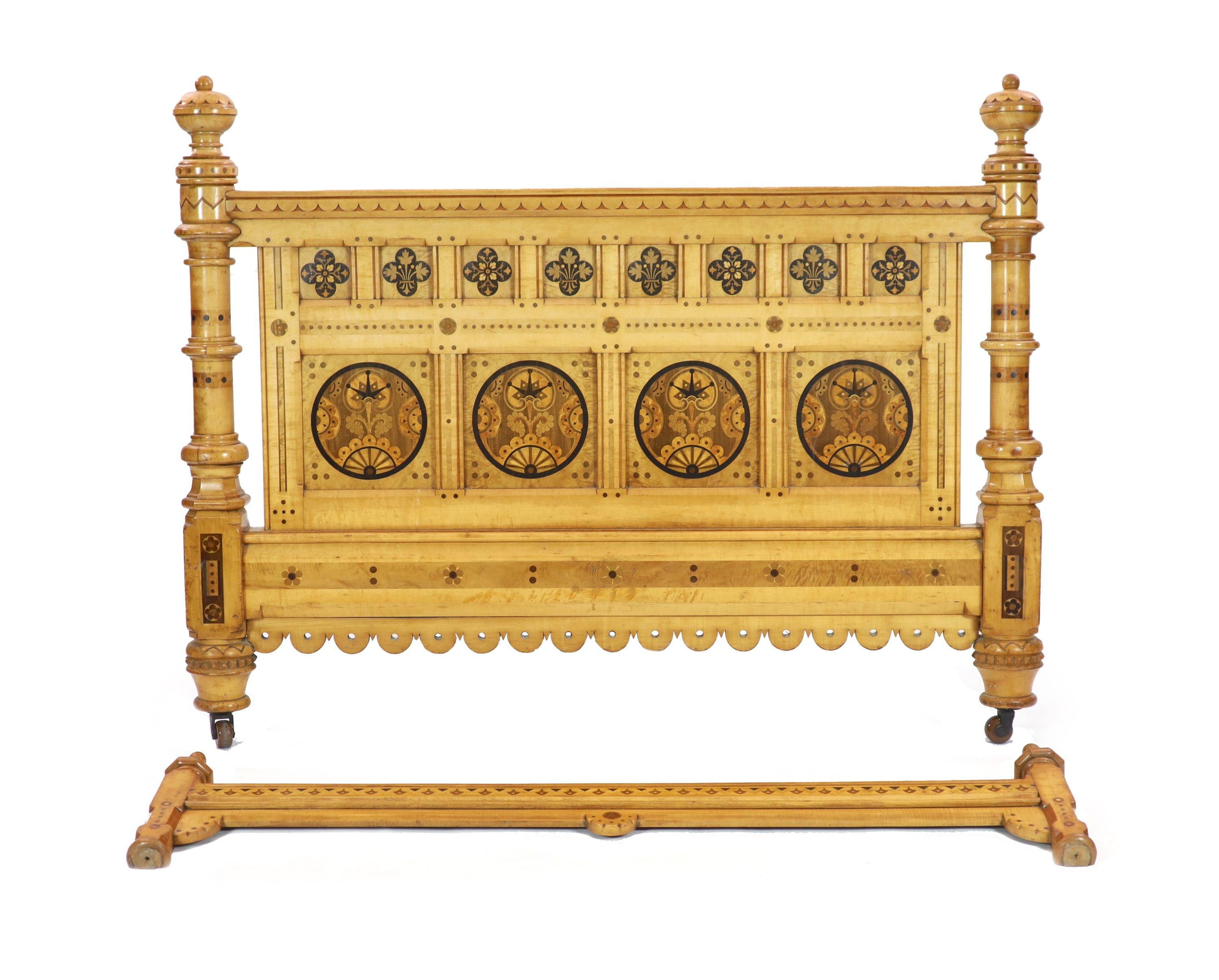 Attributed to Charles Bevan for Marsh, Jones and Cribb. An Aesthetic movement marquetry inlaid satin birch tester front panel and footboard, c.1865 H 131cm. W 168cm.